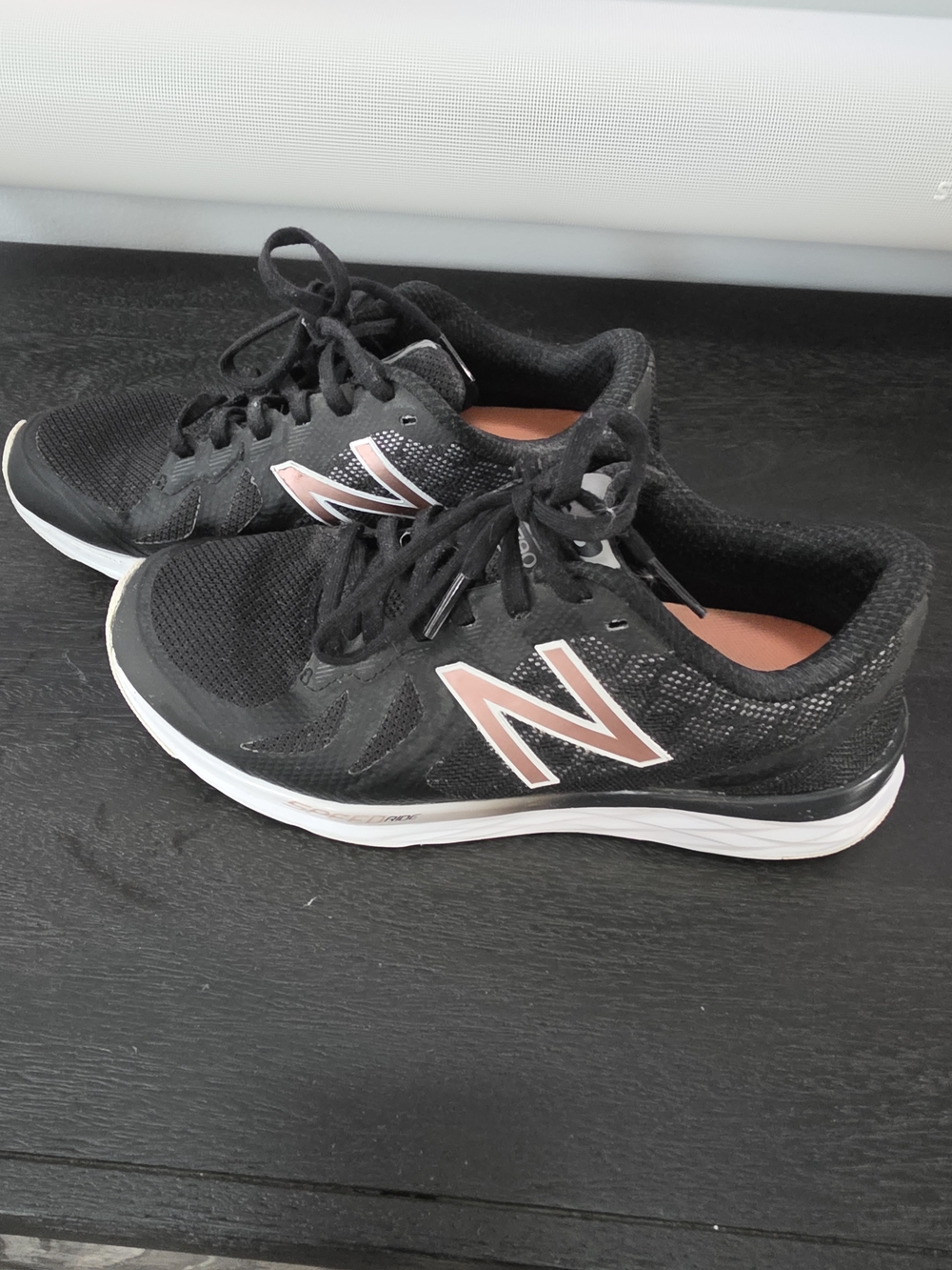 New Balance Women's Black Running Shoes with Rose Accent